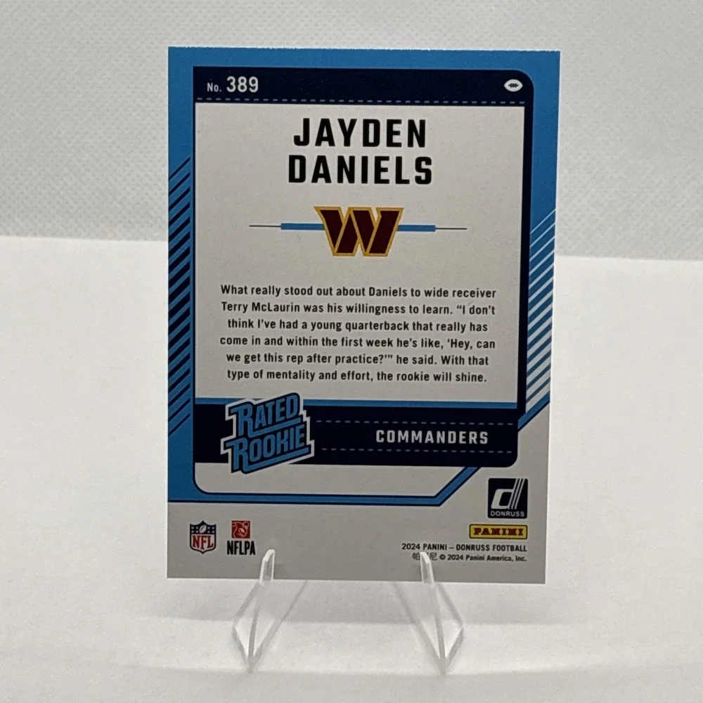 2024 Donruss‎ Jayden Daniels RC #389 Blue Press Proof Rated Rookie SP Commanders